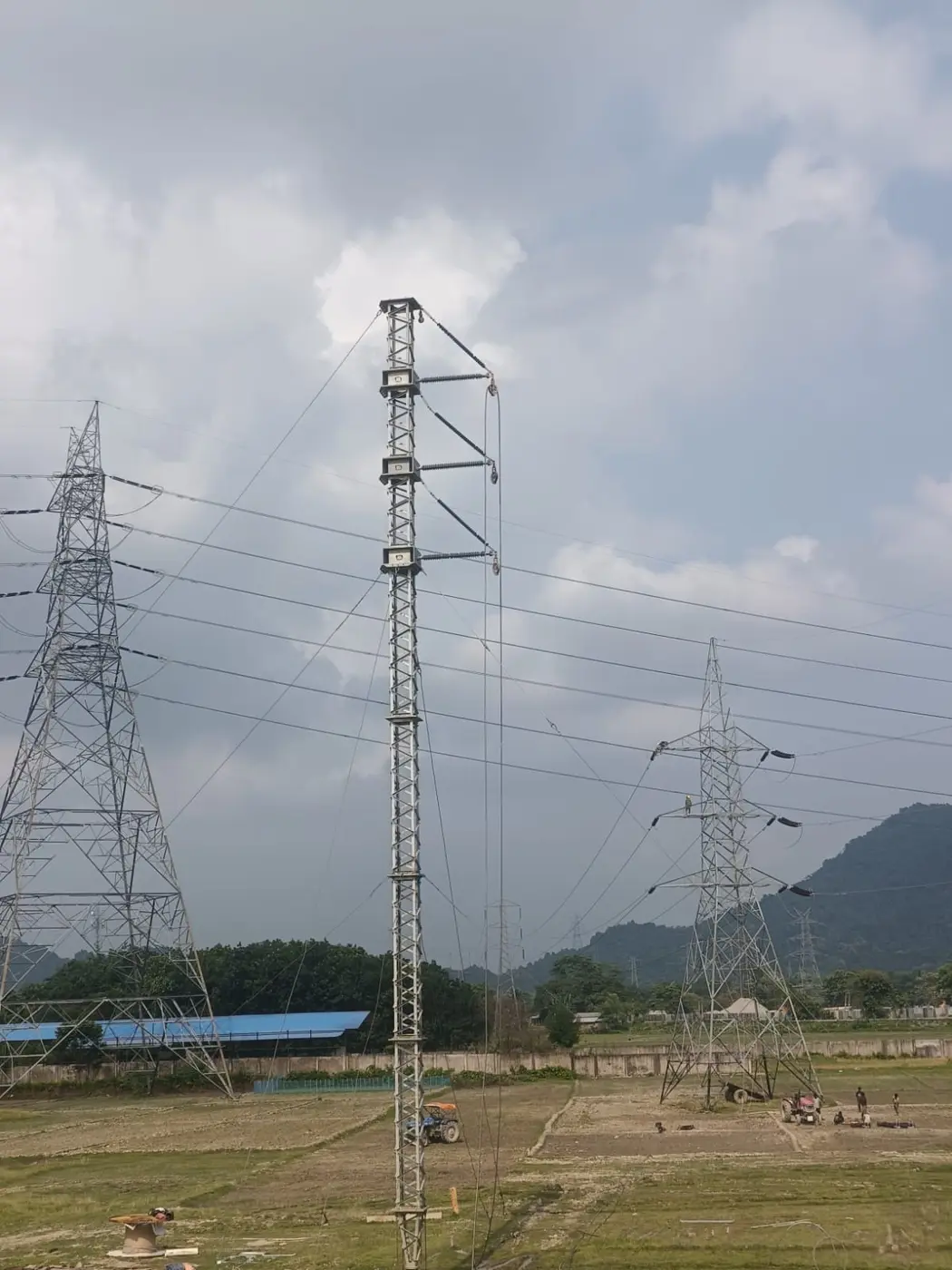 Transmission tower construction in open terrain